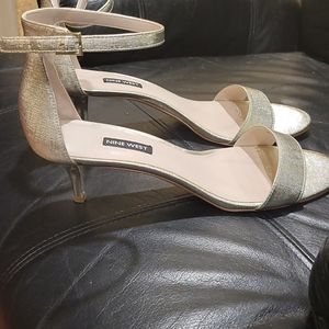 Ankle strapped sandals with kitten heel.